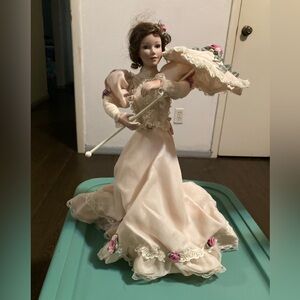Porcelain Doll in original box with papers